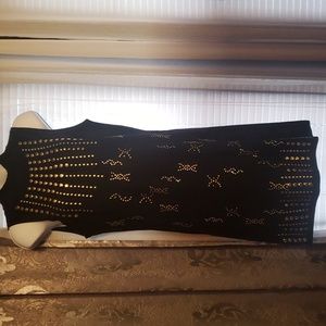NWT black turtle neck mini sleeveless sweater dress w gold studs on the front